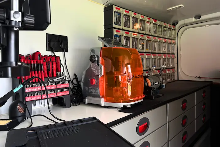 Kevin's mobile workshop inside the Auto Access van with key cutting machine and diagnostic programming equipment
